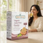 Root2Leaf Organic Amla Fruit Powder product pack in a lifestyle studio setting