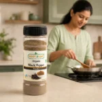 Root2Leaf Organic Black Pepper Powder product pack in a lifestyle studio setting