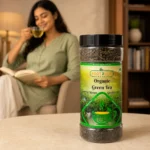 Root2Leaf Organic Green Tea product pack in a lifestyle studio setting
