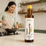 Root2Leaf Organic Mustard Oil product pack in a lifestyle studio setting