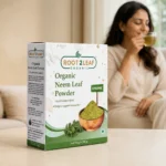 Root2Leaf Organic Neem Powder product pack in a lifestyle studio setting