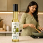 Root2Leaf Organic Olive Oil product pack in a lifestyle studio setting