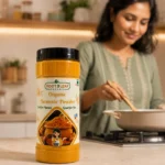 Root2Leaf Organic Turmeric Powder product pack in a lifestyle studio setting